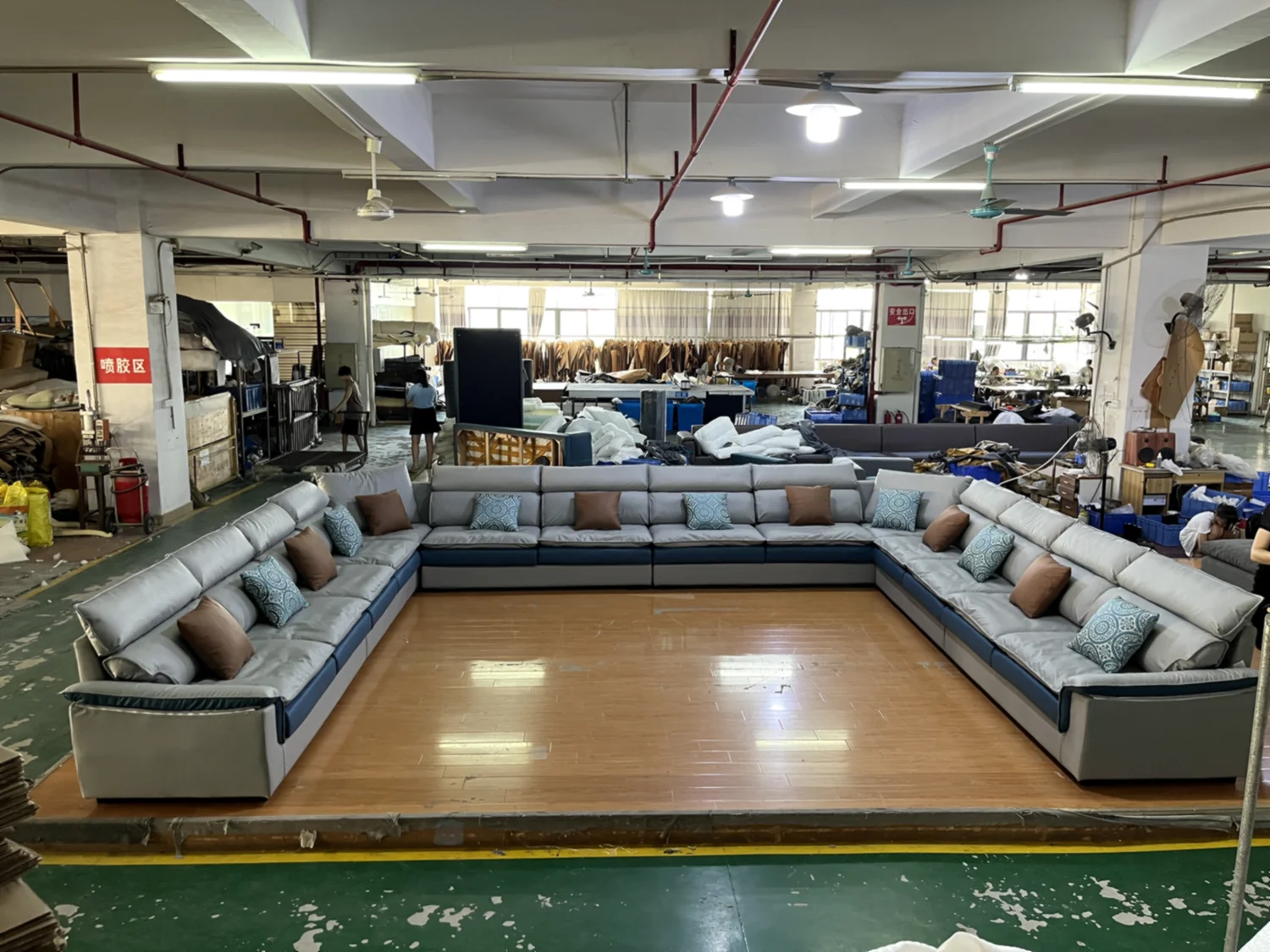 Grey sectional sofa in a partner factory setting